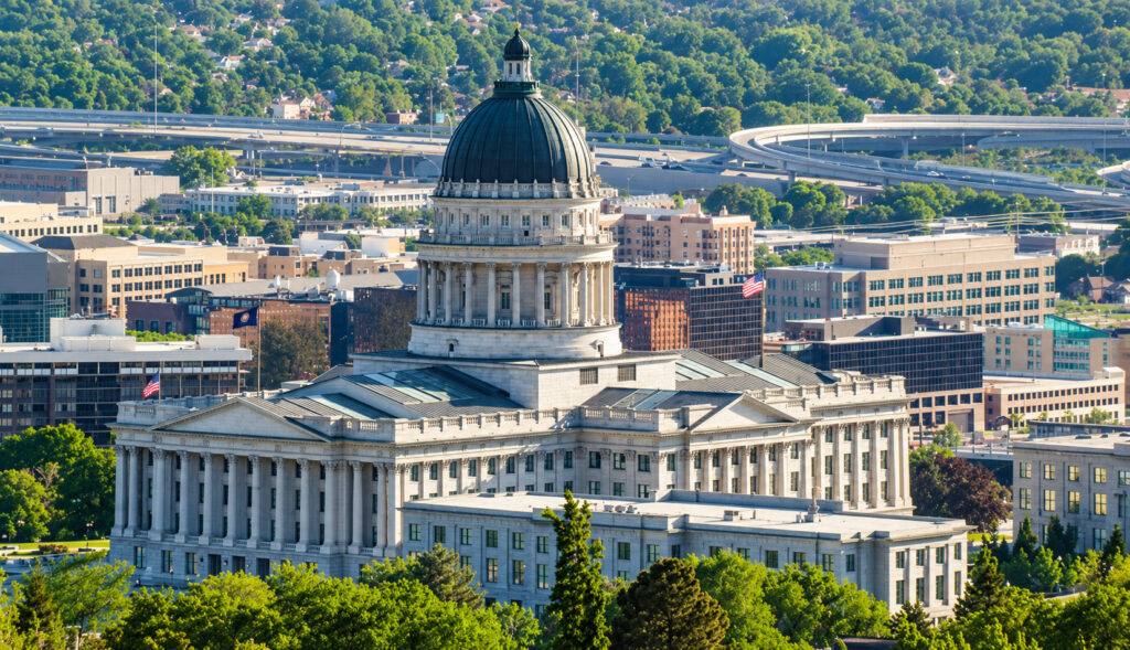 Utah State Capitol building above the trees of Salt Lake City